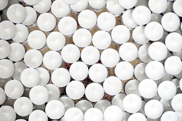 White candles on a buddhist tray. 