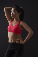Fototapeta na wymiar Young Asian Woman Preparing for Workout.