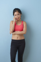 Young Asian Woman Preparing for Workout.