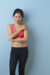 Fototapeta na wymiar Young Asian Woman Preparing for Workout.