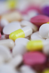 Closeup of medical capsule, healthy background