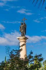 Fototapeta premium A monument Saint Michael the Archangel costs with a sword and a