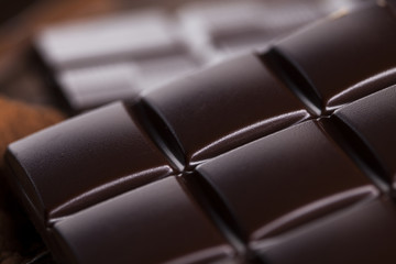Bars Chocolate , candy sweet, dessert food on wooden background