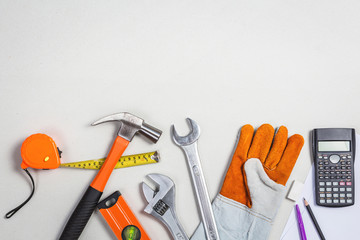 Flat lay of set Mechanic Tools of car repairing on grey paper ba