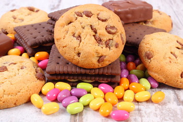 Heap of colorful candies and cookies, too many sweets