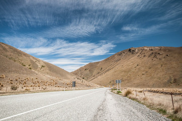 The Lindis Pass on the highway from the MacKenzie Basin to Central Otago in Southern Alps, South Island, New Zealand