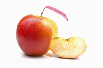 sliced from a whole piece of red ripe yellow apple