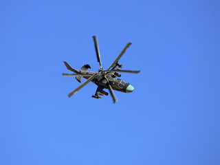 Naklejka na ściany i meble Combat helicopter in flight
