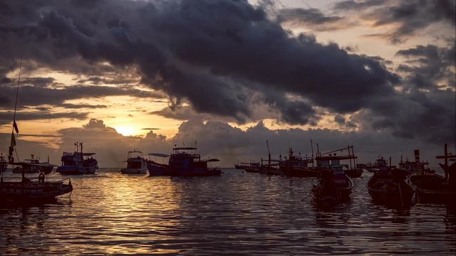Timelaps of Seascape Fishing Boat on Koh Tao Beach Warm Light Sunset Time, Many Clouds Moving, Thailand