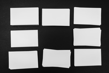 Business cards on black background .