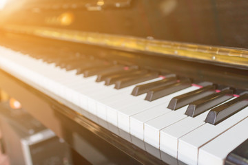 Piano with a light shining,Closeup