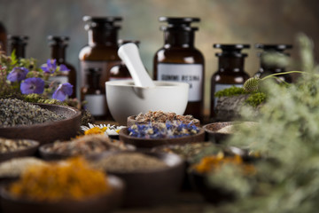 Herbal medicine on wooden desk background