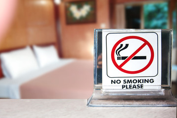 close-up of no smoking warning over bedroom or hotel background,abstract background for no smoking...