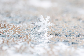 Christmas decoration of silver confetti snow flake