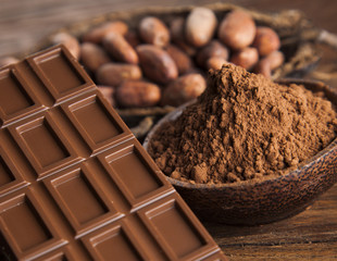 Cocoa pod and chocolate bar and food dessert background