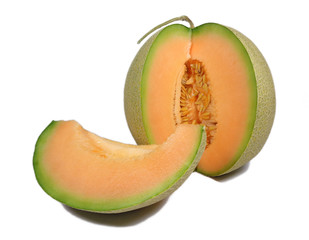 Close up of orange muskmelon with stem and single slice piece cut off isolated on white background 