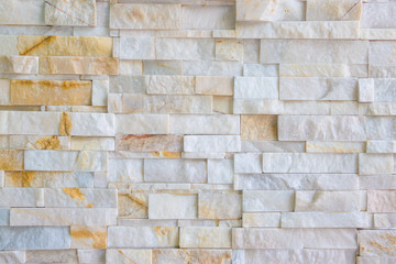 Fototapeta premium Pattern of grey and rough sandstone wall texture and backgroundม stone Cladding wall