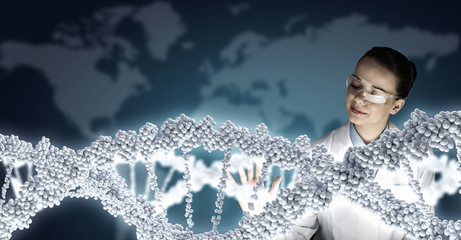 Scientist woman working in laboratory . Mixed media
