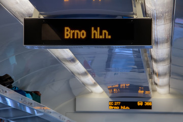 Information boards a train shows the next railway station - the city of Brno main station. - obrazy, fototapety, plakaty
