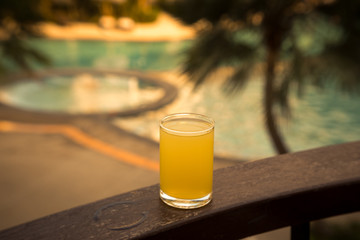 Orange juice around a swimming pool