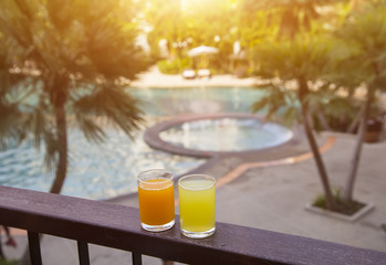 Orange juice around a swimming pool