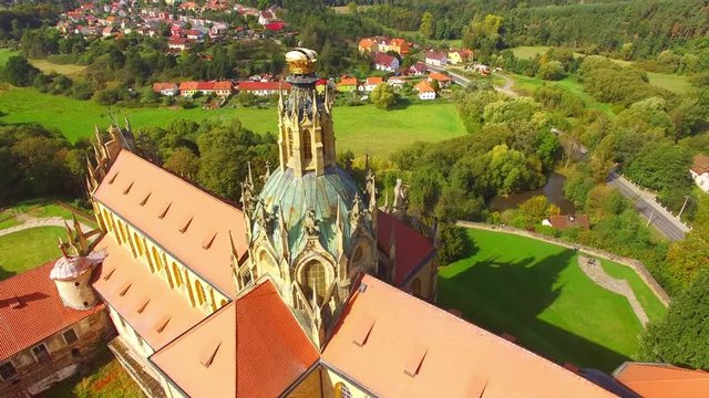 Camera flight over Benedictine monastery in Kladruby. Baroque architecture in Czech Republic. European landmarks from above.