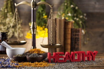Herbal medicine on wooden desk background