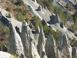 Unusual eroded rock formations (demoiselles coiffees) in the Hautes Alpes region of France, not far from Chorges