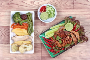Spicy sour mixed herb salad with fried stir taro in tofu sheet served with fried  mixed vegetables for  in Vegetable festival of Chinese as 