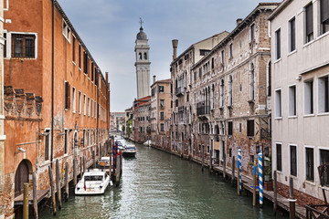 Fototapeta na wymiar Venice Small Canal Tower Day