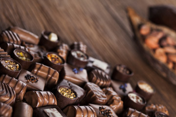 Praline Chocolate on wooden backgroud