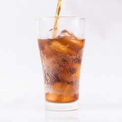 Pour soft onto glass with ice