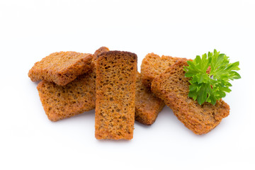 Bread croutons isolated on a white background.