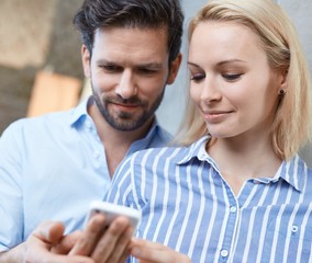 Young couple with mobile