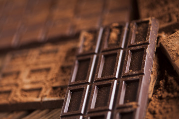 Chocolate bar, candy sweet, dessert food on wooden background