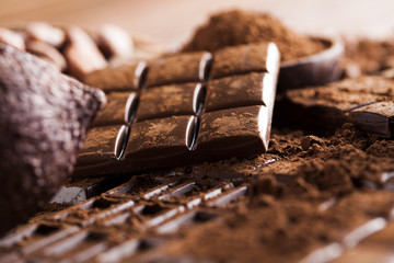 Chocolate bar, candy sweet, dessert food on wooden background