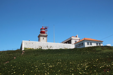 Fototapeta na wymiar A lighthouse at Caba Da Roca, Portugal