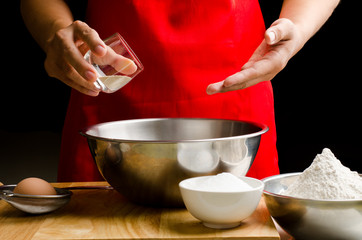 Preparation bread cooking,adding yeast in a bowl