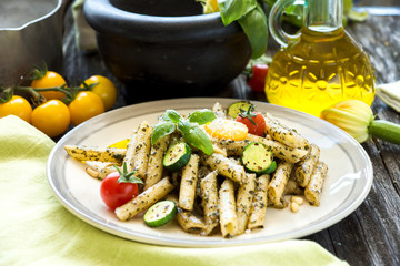 Penne with Basil Pesto, Parmesan Chesse and Tomatoes