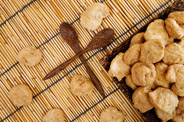chunk Textured Vegetable Protein for Vegetarian Festival with earth tone flat lay background