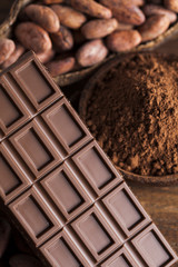 Cocoa pod and chocolate bar and food dessert background
