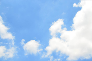 Blue sky with white fluffy clouds