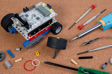 Intellectual development DIY robot toy assembly kit with microcontroller.