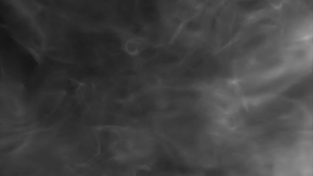 Random soft whisps of smoke float over a black background. HD 1080.