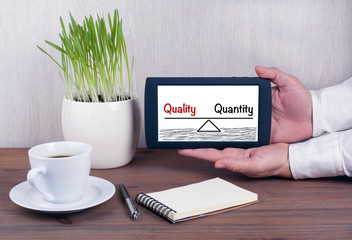 Quality and Quantity Balance. Digital tablet computer with isola