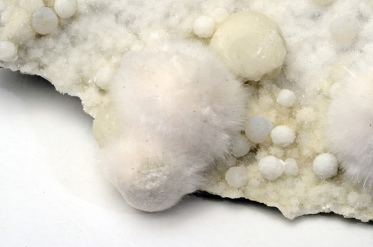 White okenite on girolite gemstone