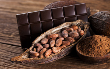 Chocolate bar, candy sweet, dessert food on wooden background