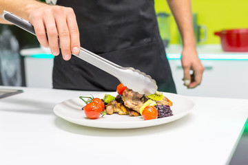 Man decorating dish