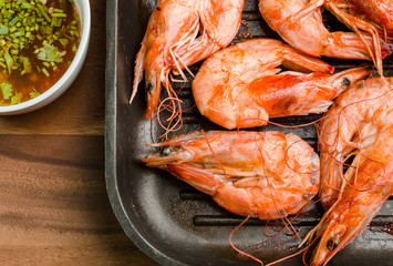 Grilled prawns served with spicy sauce