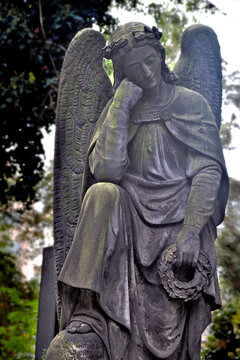 Statue of a contemplative angel